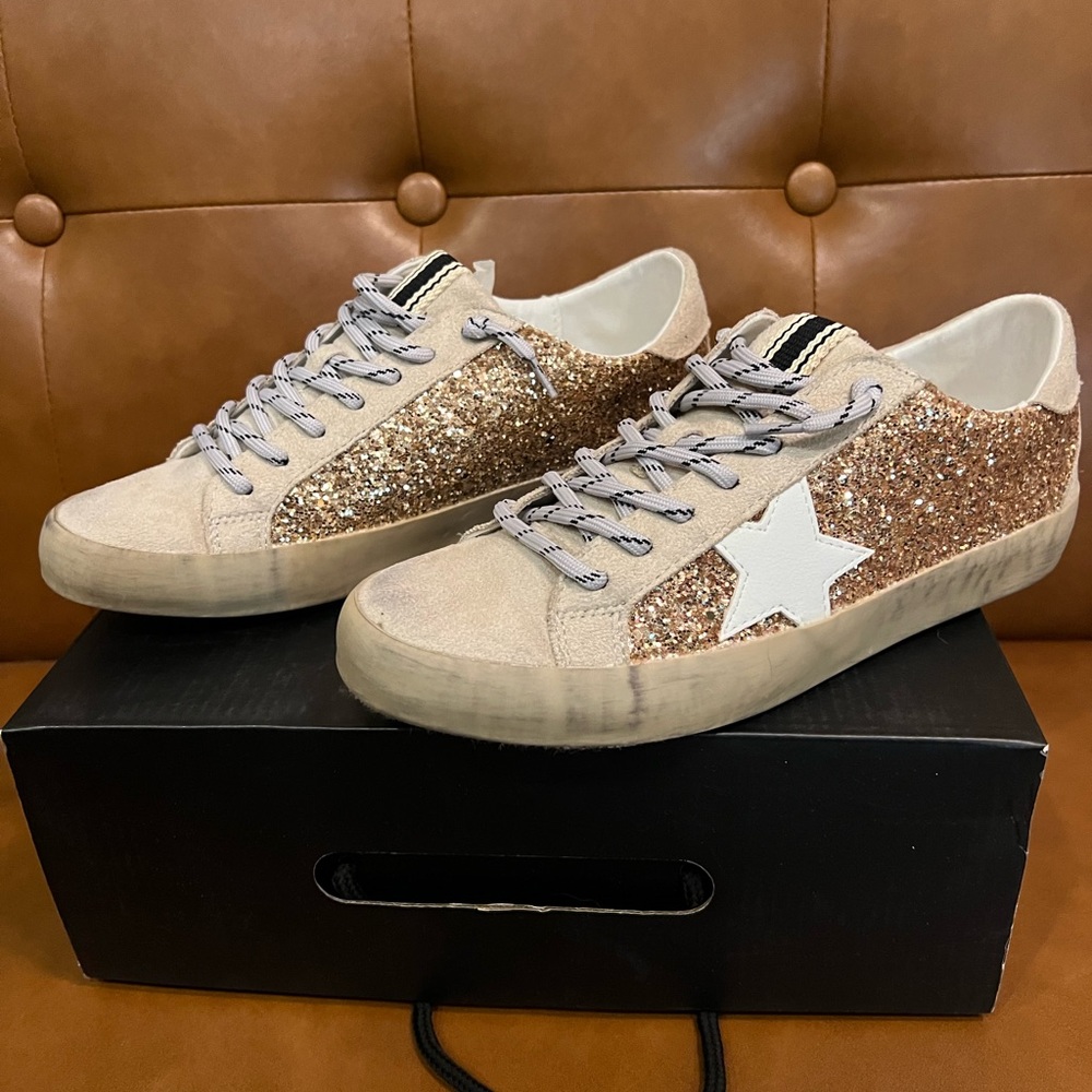Shu Shop. Gold glitter sneakers.